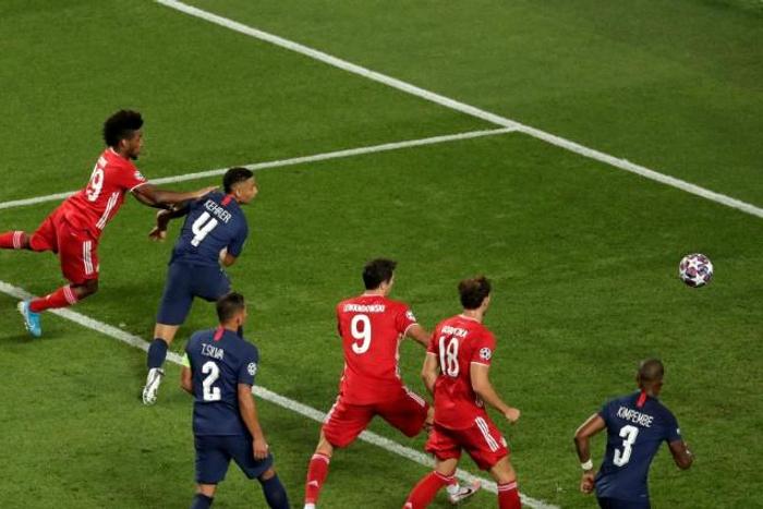 Kingsley Coman (L) heads in the winning goal for Bayern Munich in the Champions League final