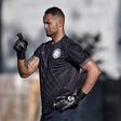 Rose Costa, the coach of Rio Branco's (Acre state, northern Brazil) women's team, resigned after the club announced the transfer of goalkeeper Bruno Fernandes, seen in a file image, who was convicted of the murder of his former lover Eliza Samudio