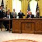 US President Donald Trump (C), Kosovar Prime Minister Avdullah Hoti (R) and Serbian President Aleksandar Vucic (L) listen to US Vice President Mike Pence during a signing ceremony, in the Oval Office of the White House in Washington, DC, on September 4...