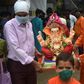 Usually Ganesha idols up to 10 metres high are paraded throught Indian cities for the festival but this year authorities have set a maximum height of 1.1 metres in a bid to cut crowds under anti-virus measures