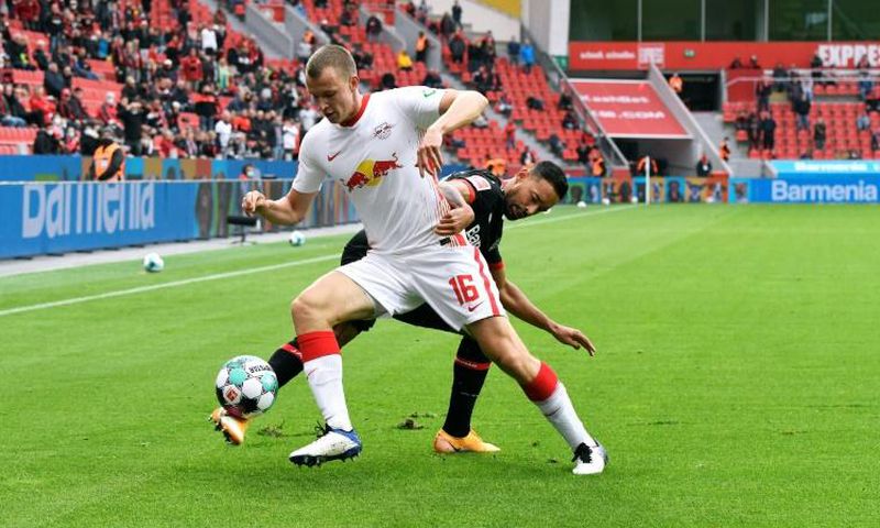 RB Leipzig's Germany defender Lukas Klostermann (L) will undergo keyhole surgery for a knee injury on Wednesday