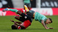 Everton defender Lucas Digne (right) fouls Southampton's Kyle Walker-Peters