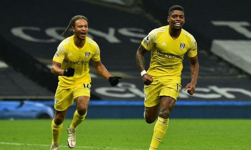 Fulham's Ivan Cavaleiro (R) celebrates scoring against Tottenham