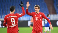 Robert Lewandowski (L) and Thomas Mueller (R) both scored for Bayern Munich on Sunday