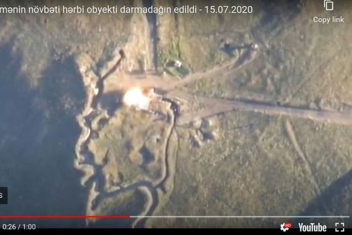 An image grab taken from a video uploaded on YouTube by the Azerbaijani Defence Ministry on July 15, 2020, allegedly shows an explosion targeting an Armenian army strong point on the Azerbaijani-Armenian border