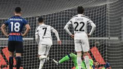 Atalanta goalkeeper Pierluigi Gollini (Rear Bottom) saves a Cristiano Ronaldo (2ndL) penalty in Turin.