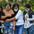 Relatives of Heine Collazos and Esneider Collazos, two of six men massacred by an armed group on August 21 in a rural area Colombia, attend their funeral