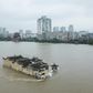 The Guanyinge temple, a 700-year old structure built on a rock in the Yangtze River in Wuhan, is surrounded by flood water