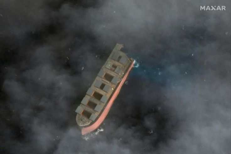 Two tugboats towed the larger part of the wreck some 15 kilometres (nine miles) out into the open ocean