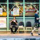 A man eats a takeaway meal outside a restaurant in Sham Shui Po, Hong Kong, after the dine-in ban was introduced