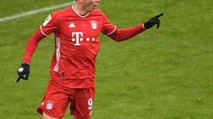 Bayern Munich striker Robert Lewandowski celebrates scoring a league-record 21 goals for the first half of the season