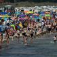 Despite COVID-19 fears, people enjoy warm summer weather at a beach near the Baltic Sea village of Binz, northern Germany
