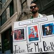 Chekib Drareni is seen outside the Algerian consulate in New York protesting Algeria's jailing of his brother, journalist Khaled Drareni