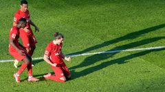 Leipzig midfielder Marcel Sabitzer (R) celebrates scoring the opening goal at Hertha Berlin