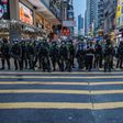 Police patrol after protesters rallied in Hong Kong to protest against the government's decision to postpone the legislative council elections