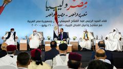 This photo posted on the official Facebook page of Egypt's presidential spokesman on July 16, 2020 shows President Abdel Fattah al-Sisi (C) meeting with mask-clad Libyan tribal leaders in the capital Cairo