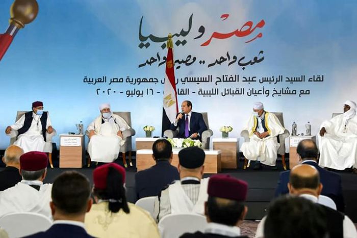 This photo posted on the official Facebook page of Egypt's presidential spokesman on July 16, 2020 shows President Abdel Fattah al-Sisi (C) meeting with mask-clad Libyan tribal leaders in the capital Cairo