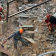 Rescue workers dig through the rubble of a badly damaged building in Lebanon's capital Beirut in search of a possible survivor from a mega-blast at the adjacent port one month ago, after scanners detected a pulse, on September 4, 2020