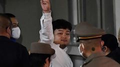 Several charges were read out against Parit Chiwarak before he was bundled into a waiting car