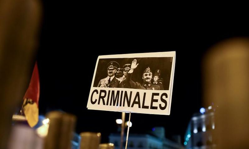 A placard depicting German leader of the Nazi party Adolf Hitler and Spanish dictator Francisco brandished in Madrid last year during a protest after Franco's remains were moved from a grandiose state mausoleum to  more discreet grave