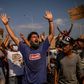 Clashes occurred near a new temporary camp built by Greek authorities where hundreds of migrants gathered to protest, some throwing stones at riot police who responded with tear gas.