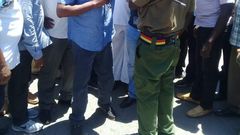 Former Machakos Senator Johnstone Muthama attempts to negotiate with police at Ukunda showground