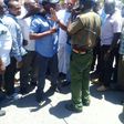 Former Machakos Senator Johnstone Muthama attempts to negotiate with police at Ukunda showground