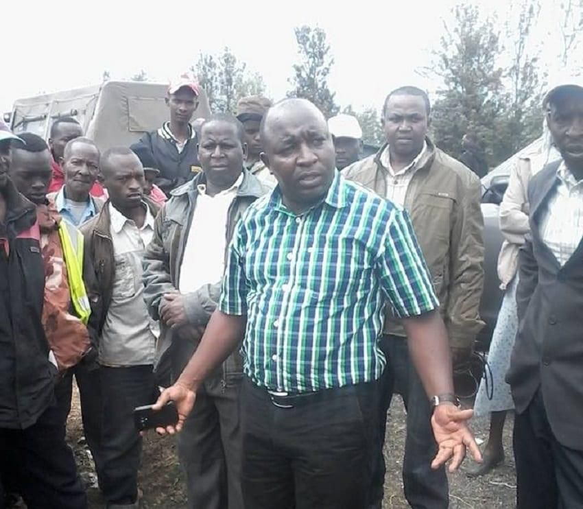 Former Laikipia East MP Anthony Mutahi (in checked green shirt)