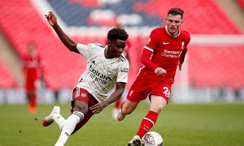 Liverpool defender Andrew Robertson (R) wants to revive struggling Scotland