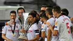 Dedication: Sevilla's Jesus Navas  holds the trophy