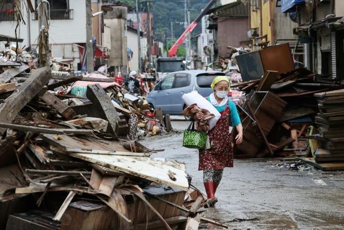 At least 72 people are confirmed to have died in torrential rains in Japan that triggered flooding and landslides
