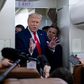 US President Donald Trump speaks with reporters aboard Air Force One on August 28, 2020