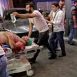 More than 4,000 wounded people staggered or were taken into damaged and overwhelmed hospitals across the Lebanese capital on Tuesday evening
