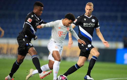 Bayern Munich and Germany winger Serge Gnabry (C) has tested positive for Covid-19