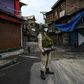 An Indian security force member stands guard in Srinagar, in Indian Kashmir, near the Jamia Masjid, the city's grand mosque