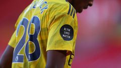 Arsenal's Joe Willock displays the Black Lives Matter badge
