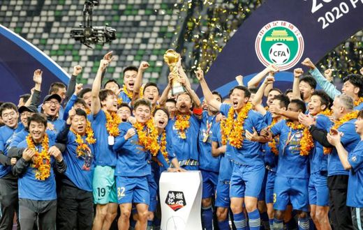 Jiangsu Suning celebrate beating Guangzhou Evergrande to win the Chinese Super League last month, but both clubs may have to change their names for next season