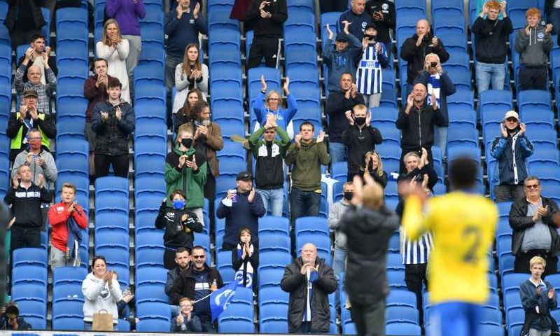 Fans attend a pre-season friendly between Brighton and Chelsea on a socially distanced basis