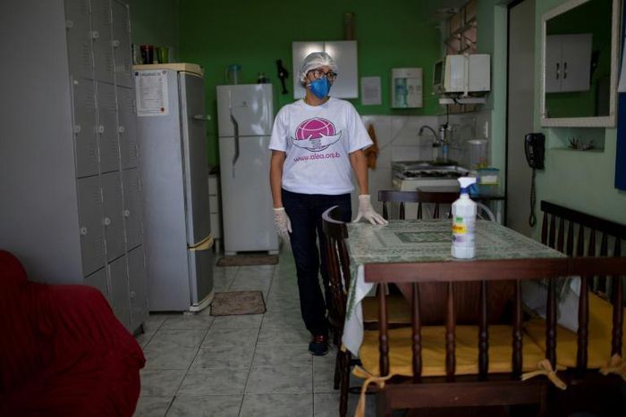 Regina Eleonora, 54, mother of the late nurse Alan Patrick -a victim of COVID-19 who passed away April 22- poses for a picture during an interview with AFP in Rio de Janeiro on June 25, 2020, Brazil