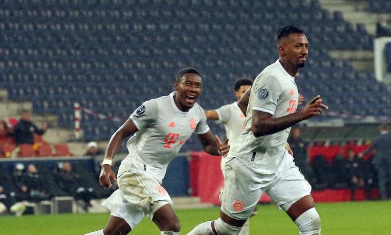 Jerome Boateng (R) says the Bayern Munich squad are behind David Alaba (L)