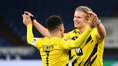 Striker Erling Braut Haaland (R) and England winger Jadon Sancho both scored in Dortmund's derby win on Saturday