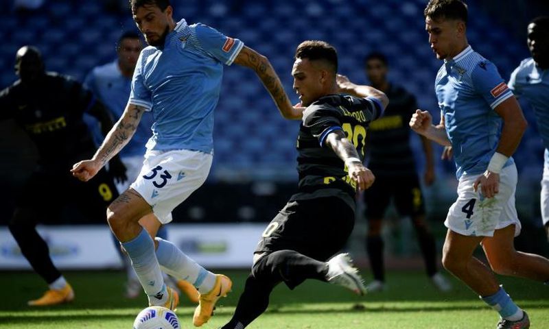 Inter Milan's Argentine forward Lautaro Martinez scores against Lazio