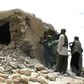 A still from a video shows jihadists destroying an ancient shrine in Timbuktu in 2012