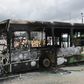 Protesters torched a bus in a working-class district of Abidjan