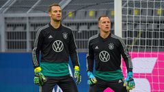 Bayern Munich star Manuel Neuer (L) will go head-to-head with Barcelona shot-stopper Marc-Andre Ter Stegen in Friday's clash of the Germany goalkeepers.
