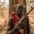 A young herdsman from the Dinka tribe poses with a semi-automatic weapon. Guns are rife in rural South Sudan, for self-protection or defence against cattle raiders