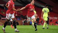 Dan the man: Daniel James (centre)celebrates scoring Manchester United's second goal