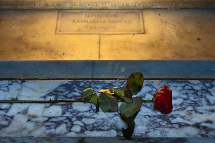 A red rose graces his grave all year round