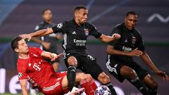 Lyon defender Fernando Marcal (C) battles with Robert Lewandowski in the Champions League semi-final against Bayern Munich