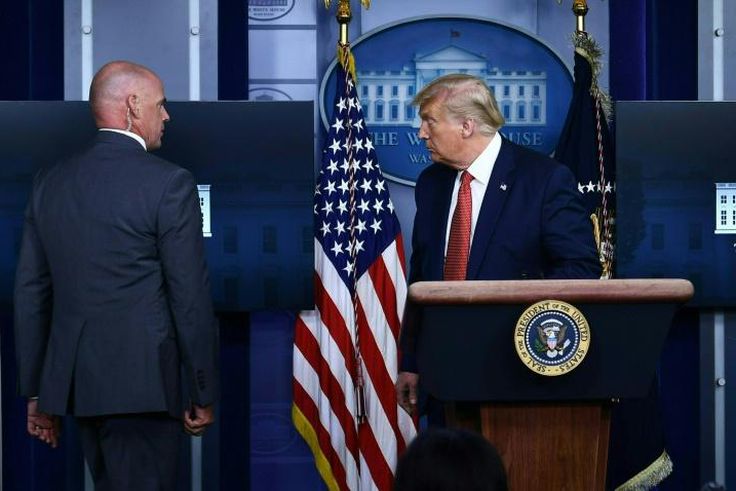 US President Donald Trump was abruptly ushered out of a press conference by secret service agents, and later said that a person had been shot outside the White House